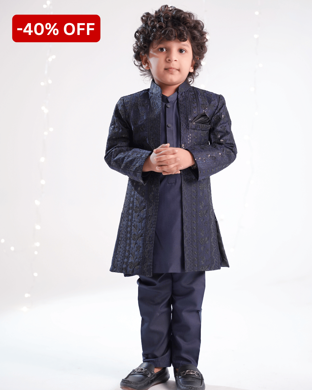 Boy wearing a navy blue premium open sherwani with embroidered fabric and wash & wear kurta trouser, perfect for weddings and formal occasion